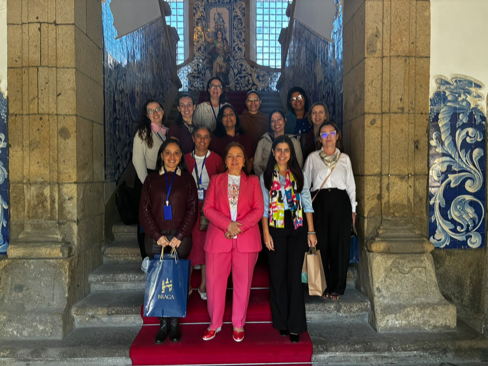 São Paulo delegation on the tiled staircase of Braga City Hall during the reception